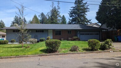 Building Photo - Spacious Three Bedroom with Large Backyard...