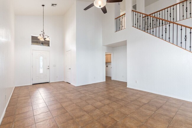 Building Photo - 4-Bed, 3-Bath Home with Versatile Layout a...