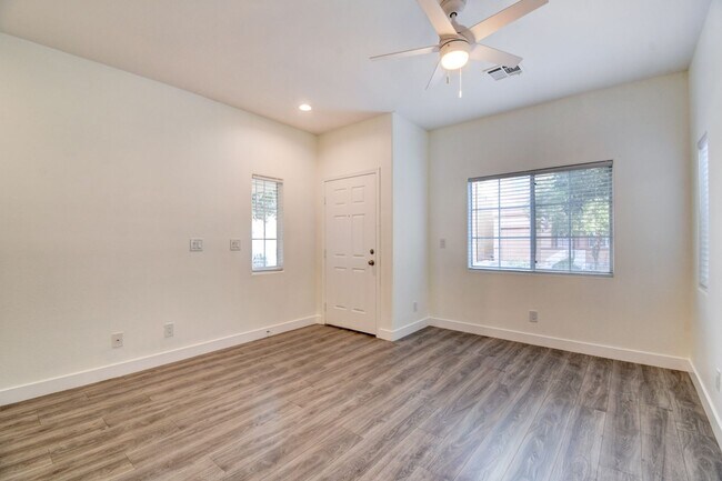 Building Photo - Great home with 4 bedrooms, 2.5 baths. New Floors Paint and Countertops.