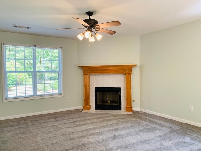 Building Photo - Great location! Lawncare/water is included...