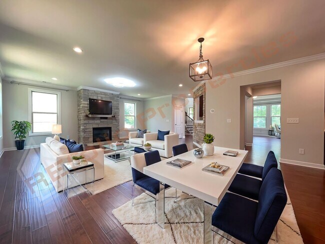 Building Photo - Gorgeous 5 Bedroom Home with First Floor In-law Suite & 3 Car Garage, Golf Course, Pool, Tennis a...