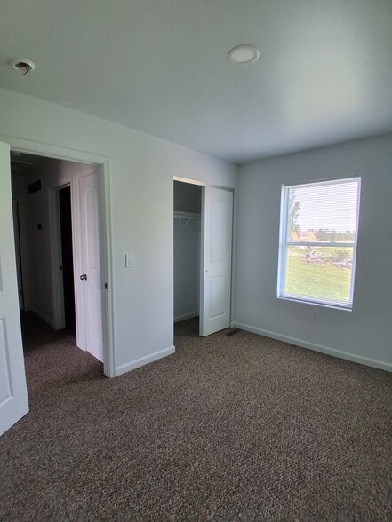 1st Bedroom - Candlelight Apartments & Condos