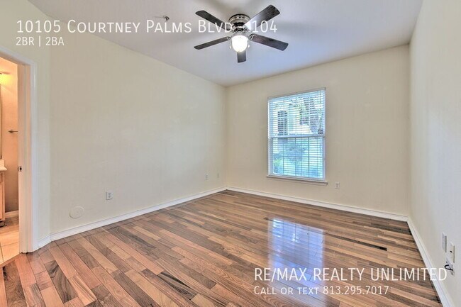 Building Photo - 10105 Courtney Palms Blvd