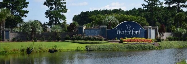 Building Photo - Leland “Waterford of the Carolina’s”  Brick one level, 2 car garage, fenced yard, high end, popul...