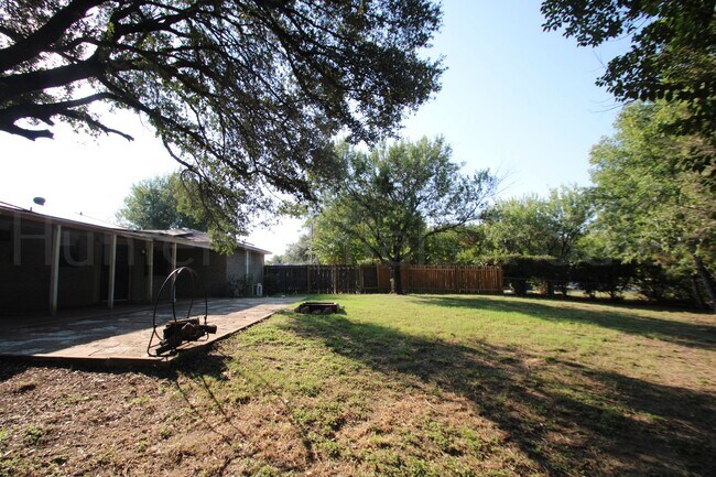 Building Photo - Spacious 4-Bedroom Home with Bonus Room, Large Yard & Solar Panels