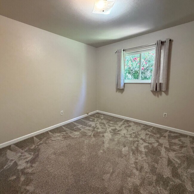Building Photo - Adorable house with large deck,  yard and RV access