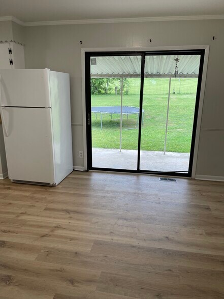 Sliding glass doors access to large covered patio - 512 Madison Ave