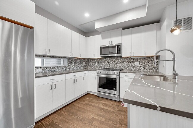 Primary Photo - $2,595.00 - 2 Bedrooms, 2.2 Bathrooms, Townhouse in Denver with Roof deck!