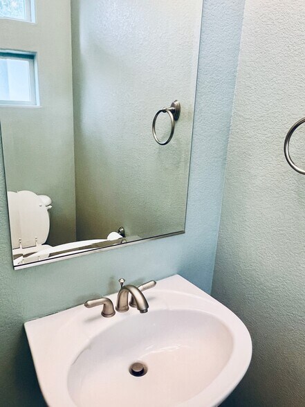 Half bath on the main floor. - 2317 Decatur St