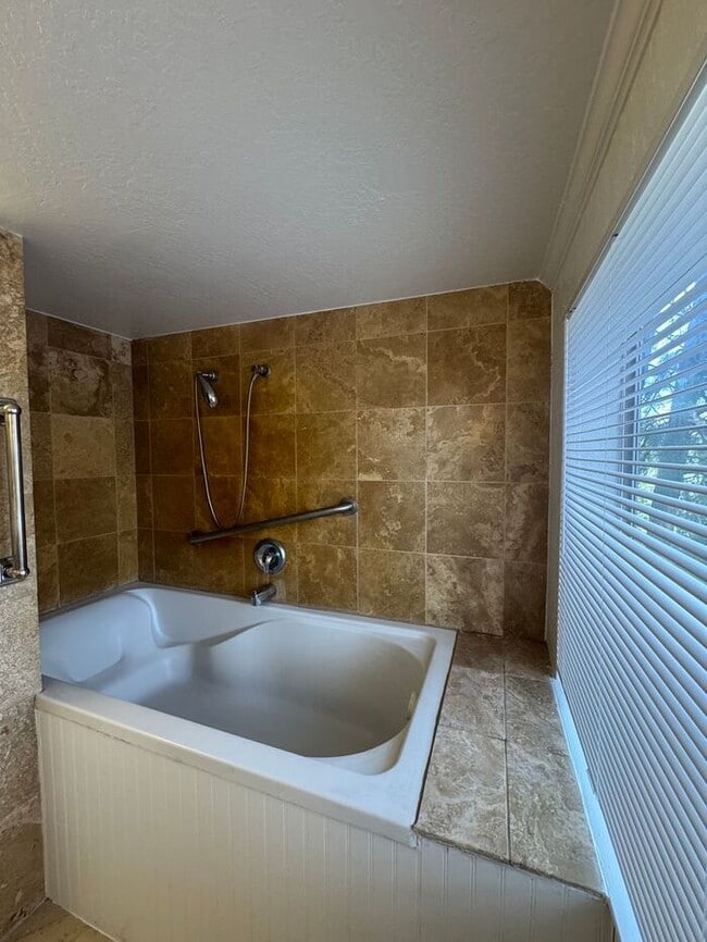 Building Photo - Charming Riverfront Cottage in Verdi – One...