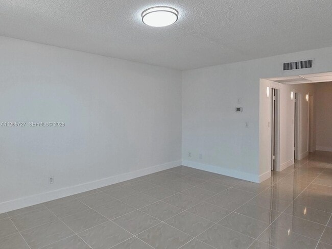 Building Photo - 19380 Collins Ave