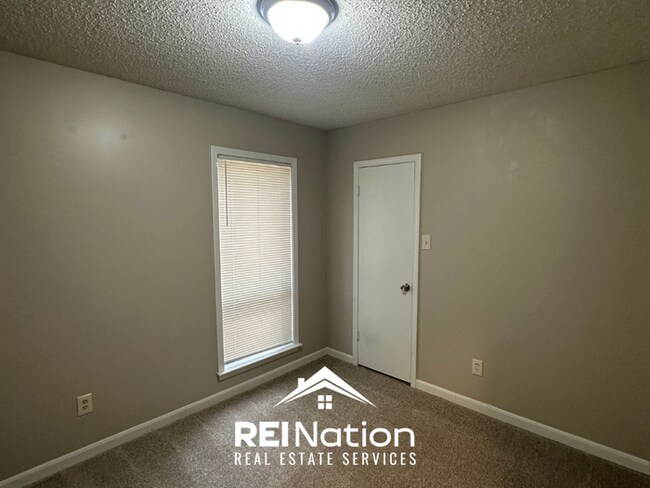 Building Photo - NEWLY RENOVATED! Massive 4BR/2BA Bartlett Stunner | Hardwoods & Fireplace!