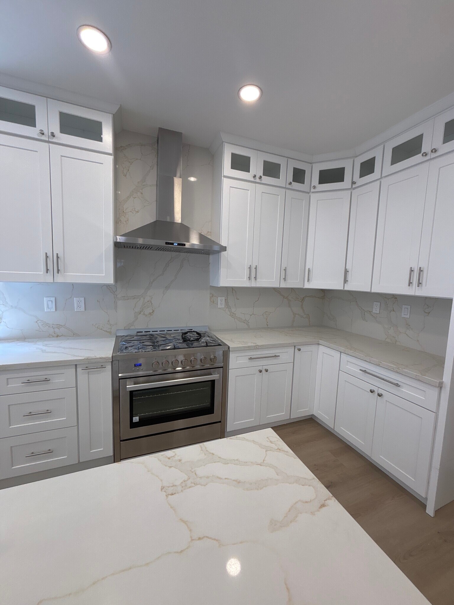 Stainless steel appliances and white kitchen cabinets. - 1062 S Shenandoah St