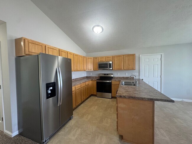 Building Photo - Newly Renovated 3BR 2BA home close to GM, Magna, Industrial Park