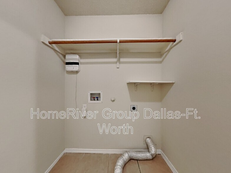 Building Photo - 9916 George Bush Dr