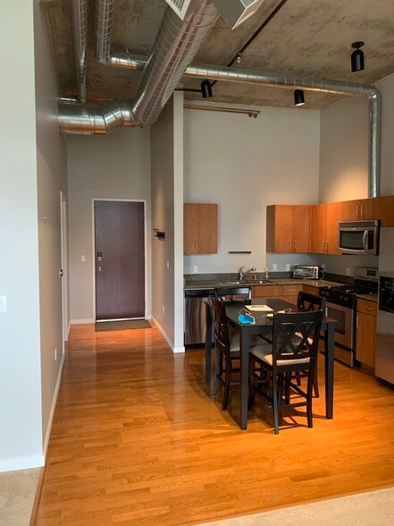 Entry/Kitchen - 3701 Arapahoe Ave Unit 107