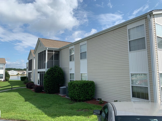 Building Photo - Three Bedroom, Second Floor Condo at South Bay Lakes in Surfside! Available Soon!