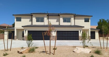 Building Photo - Nearly New 3 Bedroom Townhome.