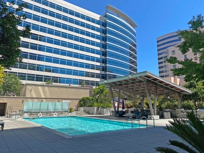 Building Photo - Live at The Axis High-Rise! Upscale, Urban...