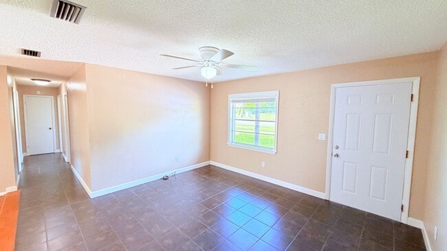Building Photo - Beautifully Renovated 3-Bedroom Home with Upgrades in Deltona Lakes!!!