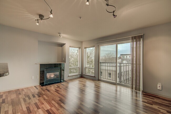 Building Photo - Top floor corner one-bedroom in the heart of it all, don't miss out, tour today!