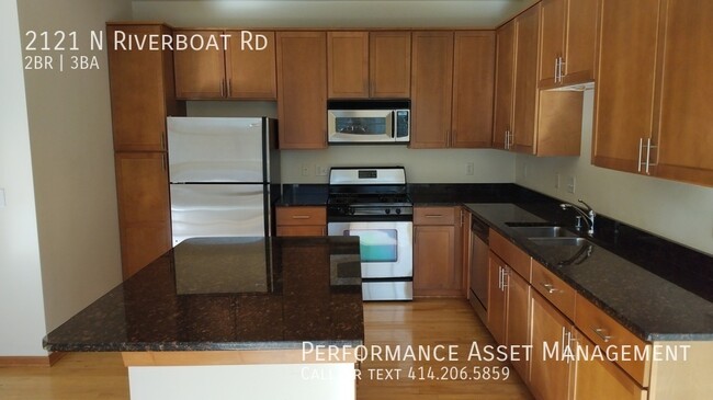 Building Photo - Multi-Level 2BD/2.5BA River Crest Condo