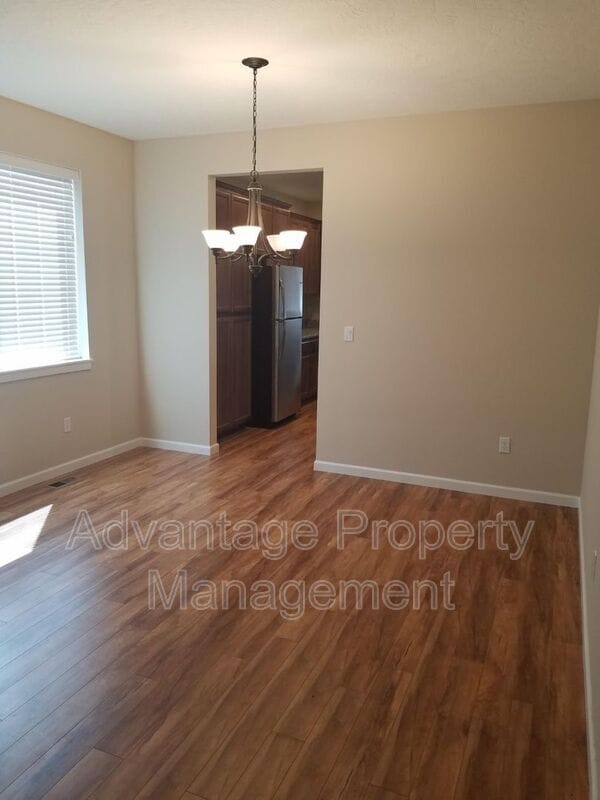 Building Photo - 5836 NE Chandra Ct