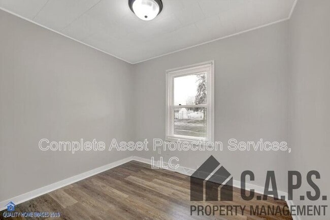 Building Photo - 7744 Bertram Ave