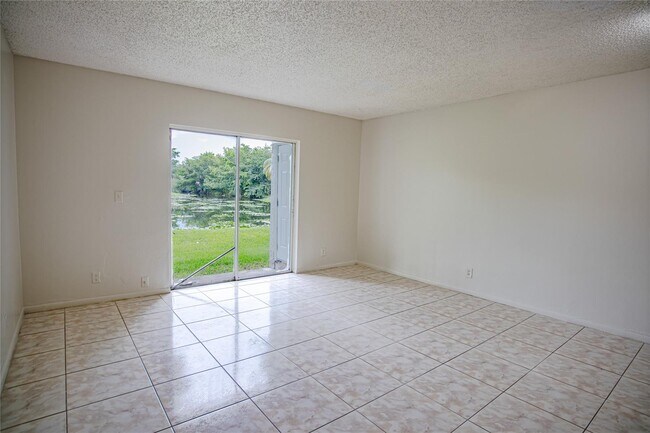 Building Photo - 4295 NW 114th Ter