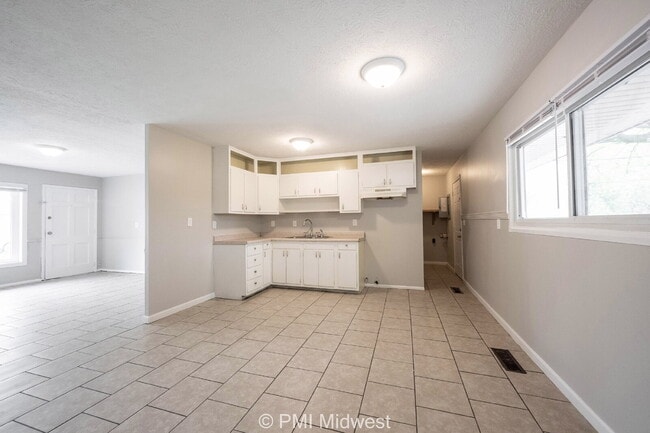 Building Photo - Coming Soon – Close to Everything You Actually Want to Do