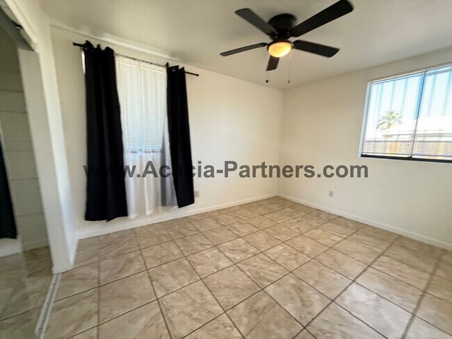 Building Photo - Three Bedroom Home