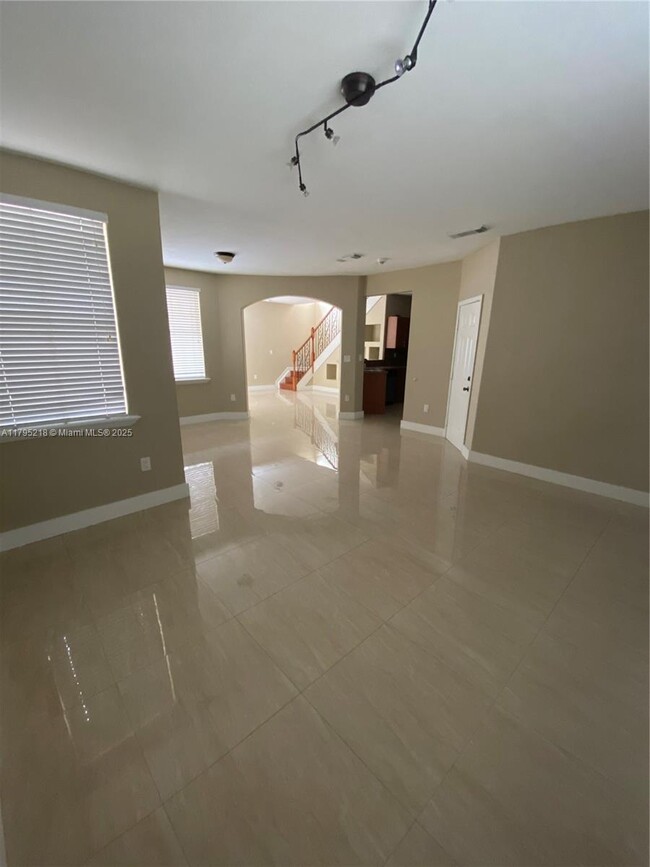 Building Photo - 4890 NW 108th Pl