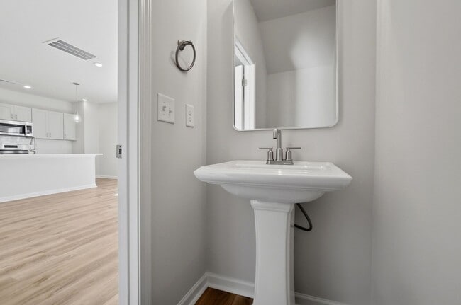 Building Photo - 4BR Home in The Pines at Paw Creek – New Construction + Private Deck