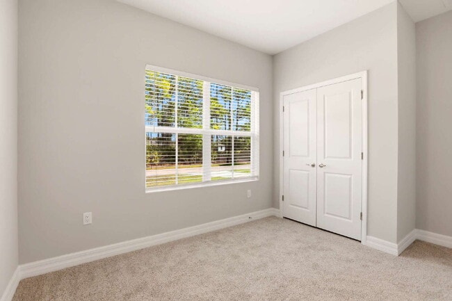 Building Photo - Brand New 4-Bedroom Gem with 2 Full Baths on Large Lot in Lehigh Acres – A Perfect Family Haven!