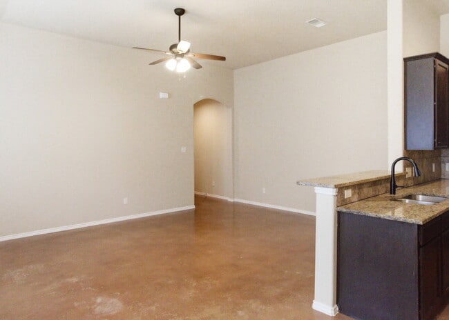 Building Photo - 3 Bedroom Duplex with Stained Concrete Floors and Greenbelt Views!