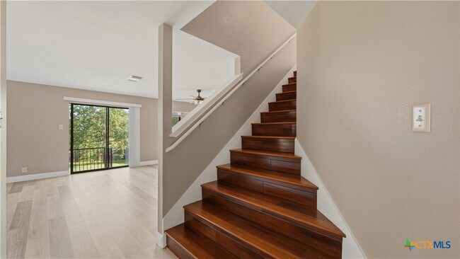 Building Photo - 7338 Raintree Forest