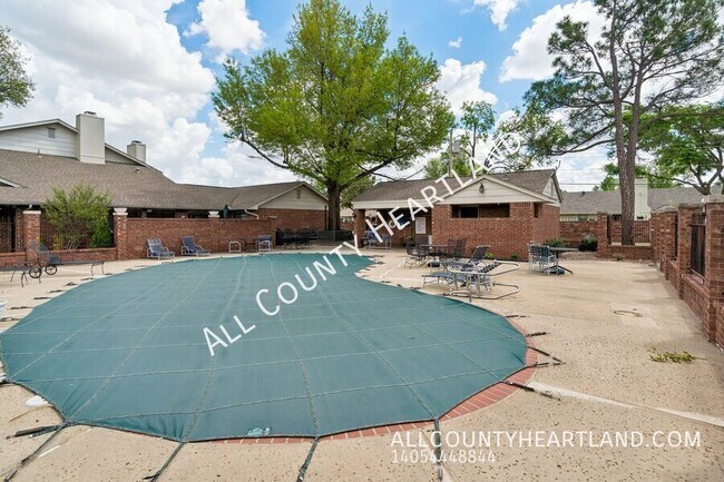 Building Photo - 9009 N May Ave