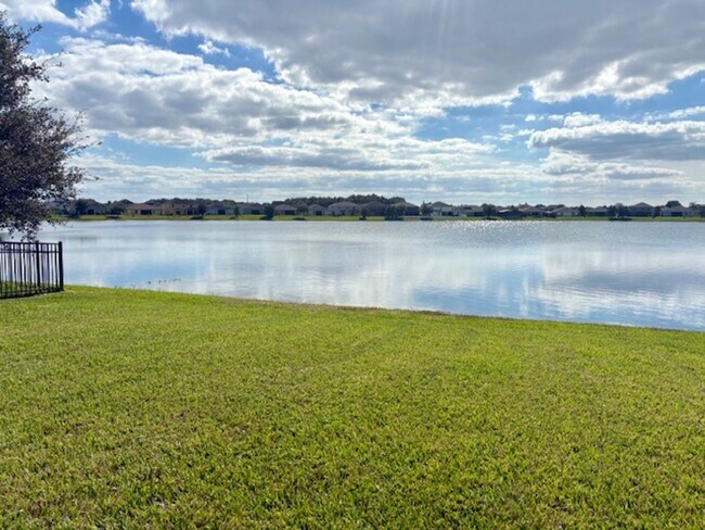 Building Photo - Water View 4/3 in Wyndham Lakes Estates near Lake Nona Medical City and O.I.A.