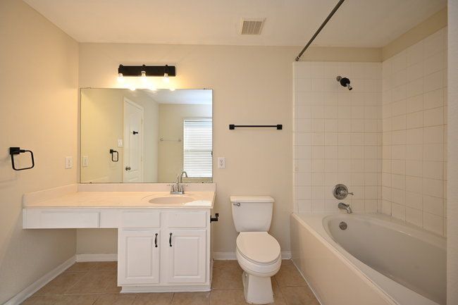 Building Photo - 9403 Coatsworth Dr