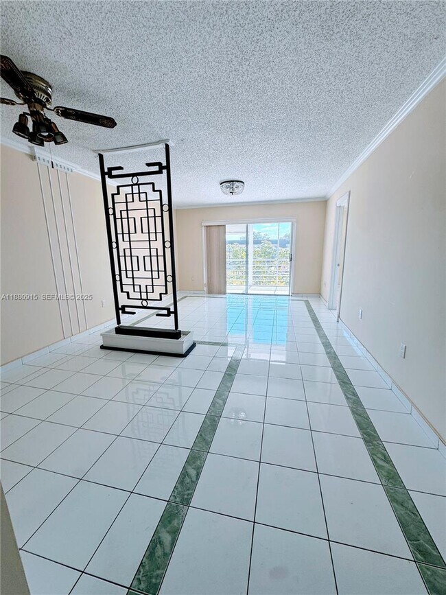 Building Photo - 8595 Sunrise Lakes Blvd