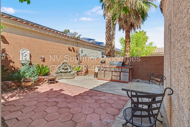 Building Photo - NW!! 4 Bedrooms!!! All Tile and Pergo flooring T/O!! NO Carpet!!! Low Maintenance Desert landscap...
