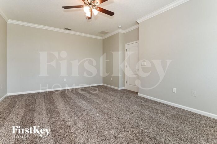Building Photo - 8906 Devon Pines Dr