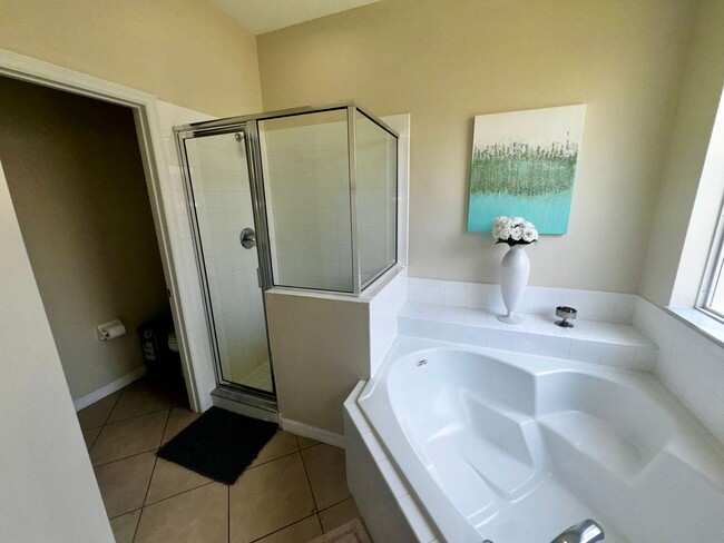 Building Photo - STUNNING Emerald Island Resort 5 bedroom 4...