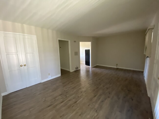 Living Area with Laminate Flooring - 1851 Riverside Drive