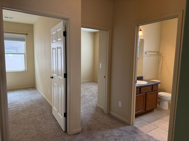 Building Photo - Beautiful 4 bedroom, 2 bath, 3 car garage ...