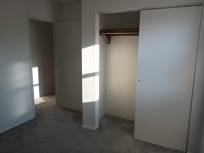 Spare bedroom view of closet and entry door. - 1331 N Black Horse Pike