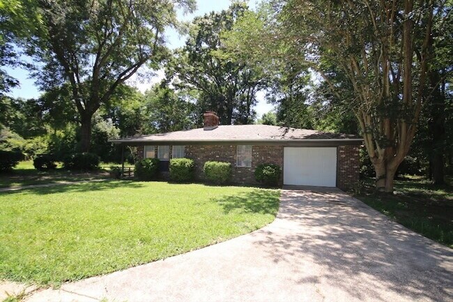 Building Photo - Fully Renovated 3BR/2BA Molino Home on a Spacious Lot Featuring Multiple Living Areas, Sunroom & ...