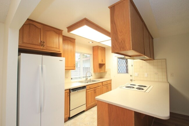 Building Photo - Welcome to this beautifully refreshed 4-bedroom, 2-bath two-story home located in desirable North...