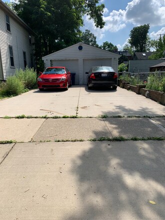 Driveway parking on right - 422 W William St
