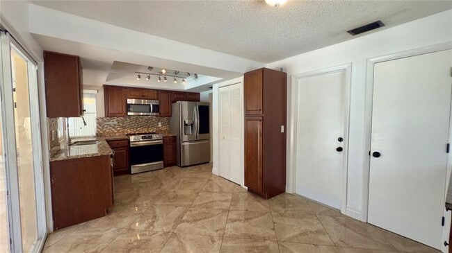 Building Photo - 6957 NW 9th Ct